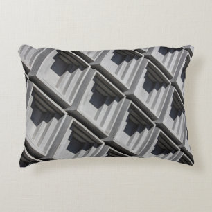 Close-up photo of gray building accent pillow