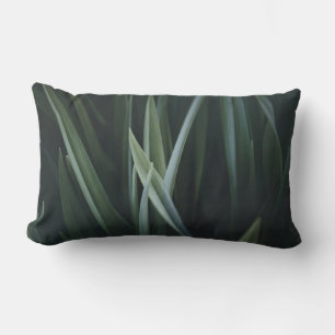 Close up photo of green linear leaves lumbar pillow