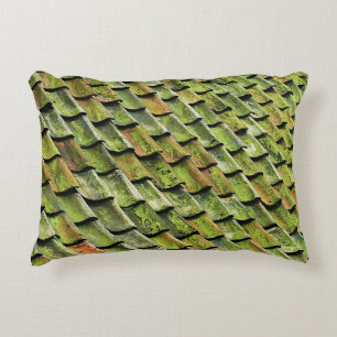 Close-up photo of green shingle roof accent pillow