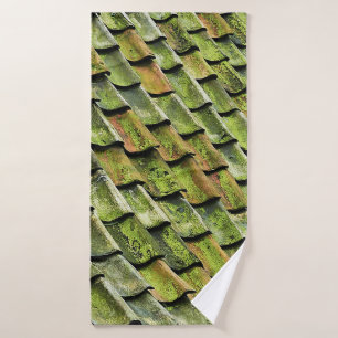 Close-up photo of green shingle roof bath towel