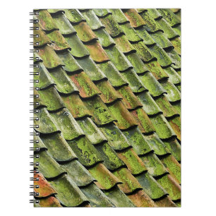 Close-up photo of green shingle roof notebook
