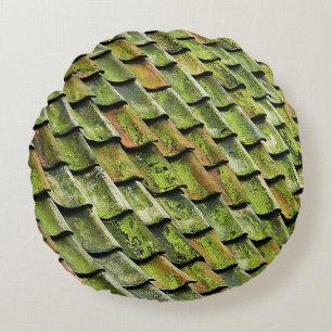 Close-up photo of green shingle roof round pillow