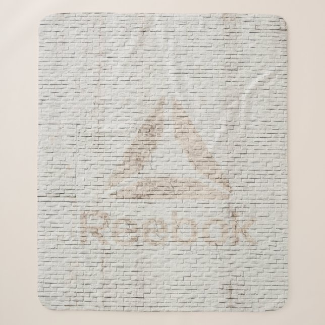 Close-up photo of Reebok logo on wall Sherpa Blanket (Front)