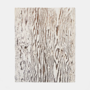Close up photography of brown wooden surface fleece blanket