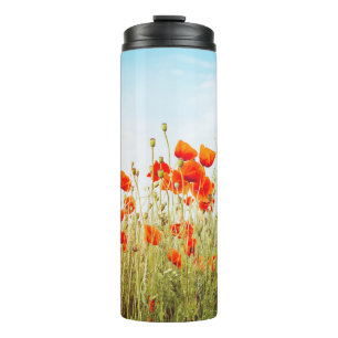 Close up poppies on field. Wild flowers in springt Thermal Tumbler