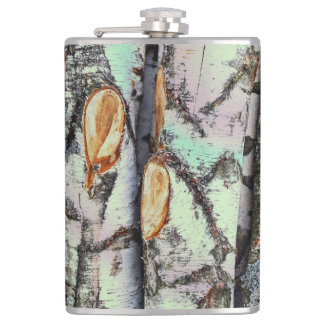 Close-up scene of birch log stumps, rustic charm hip flask