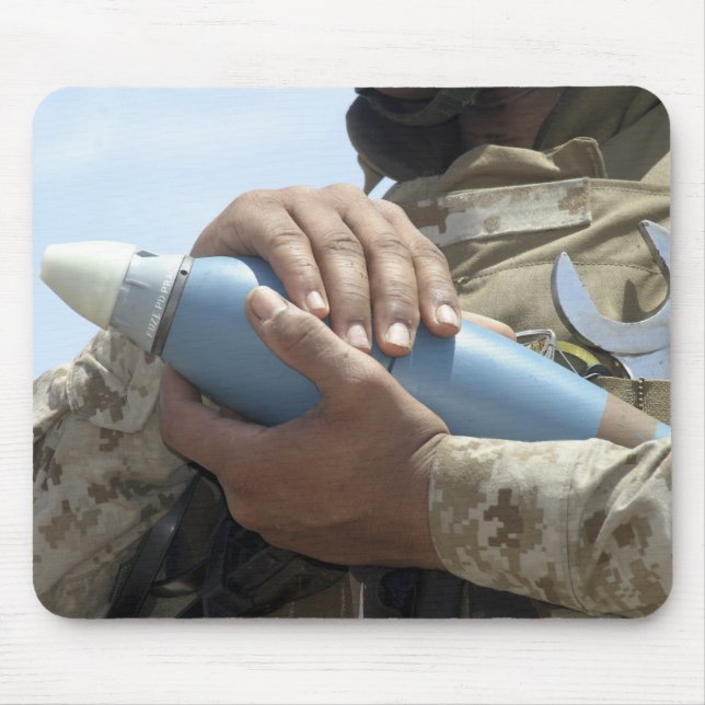 Close-up view of a soldier cradling a munition mouse pad (Front)