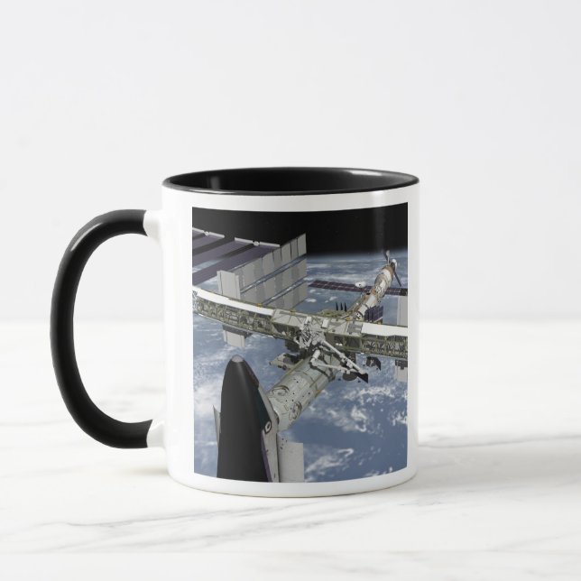 Close up view of the Shuttle docked Mug (Left)