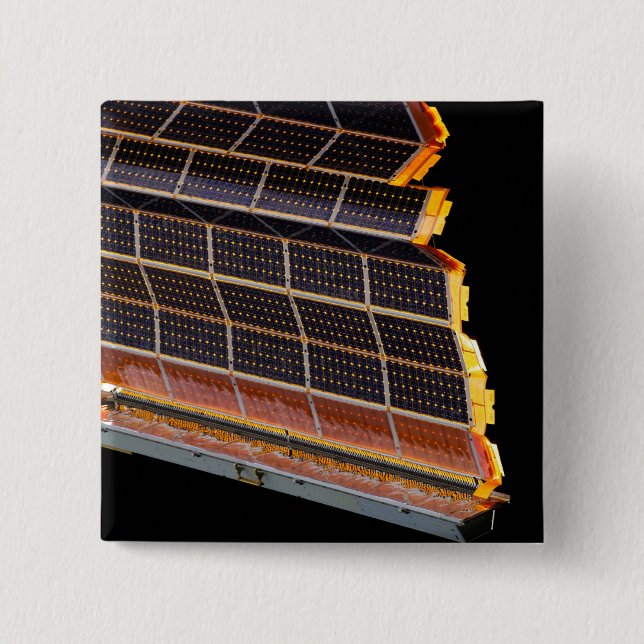 Close-up view of the solar arrays 2 inch square button (Front)