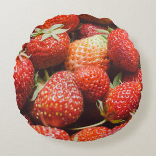 Close-up view on fresh summer strawberry with vint round pillow