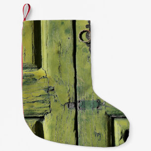 Closed brown wooden 2-panel door small christmas stocking