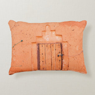 Closed wooden window in traditional moroccan house accent pillow