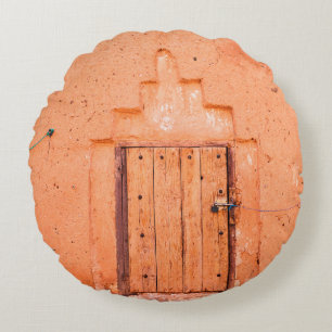 Closed wooden window in traditional moroccan house round pillow