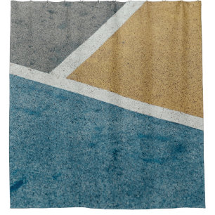Closeup grey, yellow, and blue painted pavement