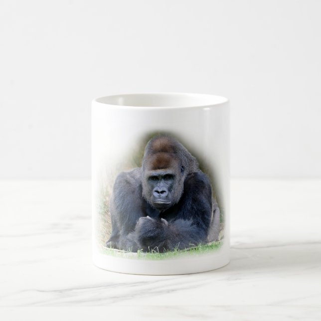 Closeup of gorilla lying on grass coffee mug (Center)