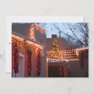 Closeup of holiday lights on building card