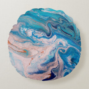 Closeup of mixed blue and white abstract marble te round pillow