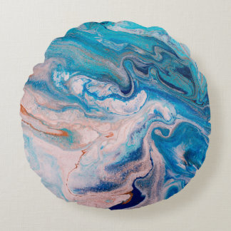 Closeup of mixed blue and white abstract marble te round pillow