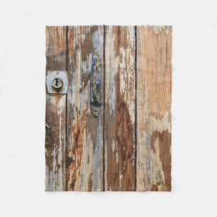 Closeup photo of brown wooden board fleece blanket
