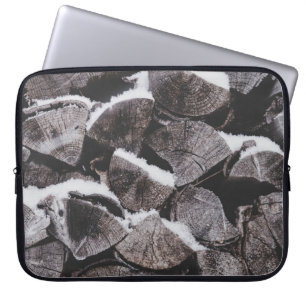 Closeup photo of firewood stack laptop sleeve