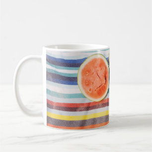 Closeup photo of slice watermelon fruits on cloth coffee mug