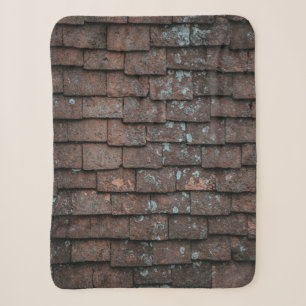 Closeup photography of brown and grey concrete bri sherpa blanket