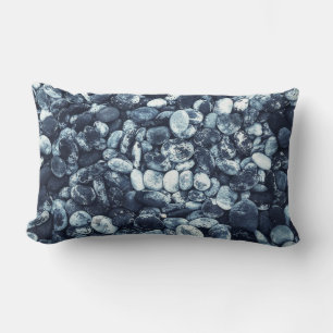 Closeup photography of stones lumbar pillow
