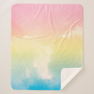 cloud background with a pastel coloured gradient.  sherpa blanket