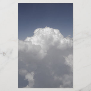 Clouds at 30,000 feet from an airplane window stationery