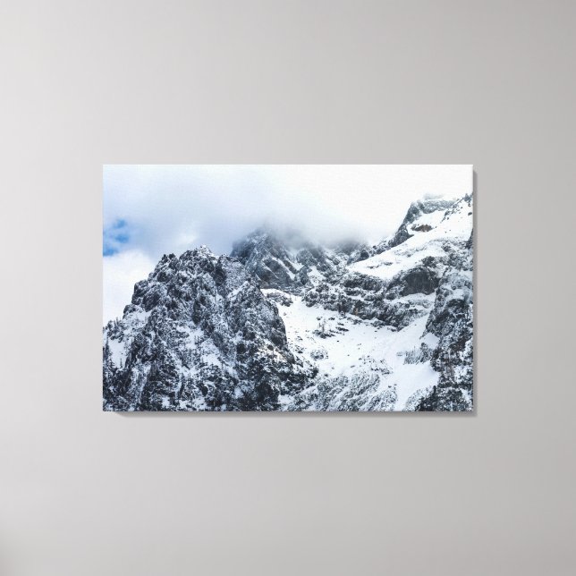 Clouds covering majestic mountains canvas print (Front)