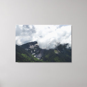 Clouds covering mountains canvas print