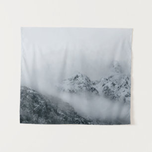 Clouds flowing over mountains tapestry