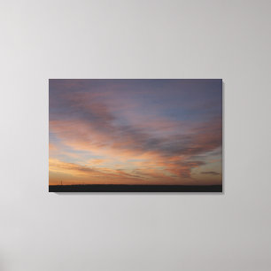 Clouds In An Orange Sky At Sunrise Canvas Print