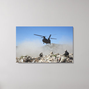 Clouds of dust kicked up by the rotor wash canvas print