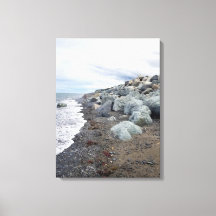 Clouds over a Rocky Beach Stretched Canvas Print