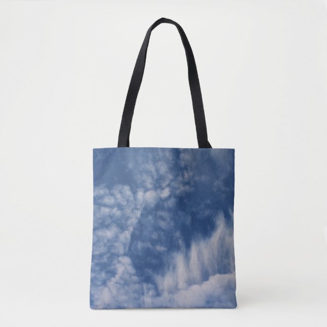 Clouds with teeth on an all over print tote (Front)