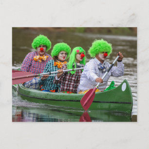 Clowns boating on river. holiday postcard