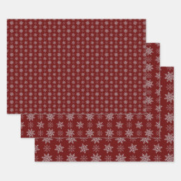 Cluster of Snowflakes on Deep Red Wrapping Paper Sheet