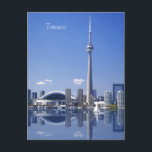 CN Tower and buildings in Toronto, Ontario, Canada Postcard<br><div class="desc">The CN Tower surrounded by buidings in the cityscape of Toronto,  Ontario,  Canada with reflection off the water with sailboat</div>