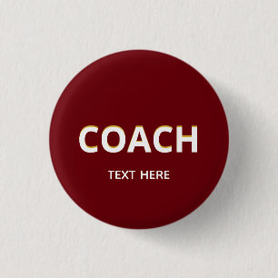 Coach text on maroon 1 inch round button