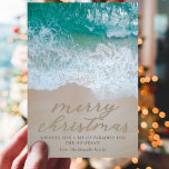 Coastal Beach Christmas Holiday Card<br><div class="desc">Simple beach christmas holiday card featuring a tropical sandy shoreline,  turquoise blue sea,  the festive saying "merry christmas" written in the sand,  a personalized message,  and your family name.</div>