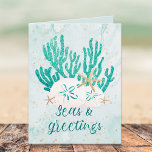 Coastal Beach SEAS & GREETINGS Turquoise Glitter Holiday Card<br><div class="desc">Coastal, beach or tropical Christmas holiday card featuring the greeting SEAS AND GREETINGS in modern calligraphy script typography in turquoise, aqua and teal watercolor with coral, starfish and sand dollars accented with faux glitter and your custom text inside. OPTIONS: The sample is shown on the 4x5.6" satin card--5x7 or matte...</div>