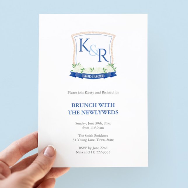 Coastal Blue And White Crest NewlyWeds Brunch Invitation (Classy Nautical Newlyweds brunch invitation featuring a navy blue & white watercolor monogram crest)