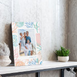 Coastal Christmas Beach Watercolor Seashell Photo Plaque<br><div class="desc">Who needs snowflakes when you have seashells! Capture a cool nautical casual and coastal vibe this holiday sea-son with our coastal seaside-inspired holiday Christmas collection. We've hand-painted beautiful watercolor ocean seashells photo frame in splashes of coastal blue, rosy pink, sandy white, teals, and peach shades to create a calm coastal...</div>