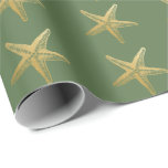 Coastal Christmas Starfish on Green Wrapping Paper<br><div class="desc">Beautiful starfish theme wrapping paper for Christmas at the beach! An elegant gold starfish on holiday green for the prettiest coastal Christmas wrapping theme you can find! Pair with another colour from our collection for a coordinated designer look under the tree this year.</div>