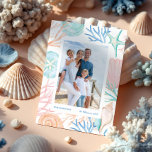 Coastal Christmas Watercolor Seashell Two Photo Holiday Card<br><div class="desc">Who needs snowflakes when you have seashells! Capture a cool nautical casual and coastal vibe this holiday sea-son with our coastal seaside-inspired holiday Christmas collection. We've hand-painted beautiful watercolor ocean seashells photo frame in splashes of coastal blue, rosy pink, sandy white, teals, and peach shades to create a calm coastal...</div>