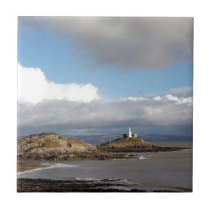 Coastal landscape and lighthouse tile