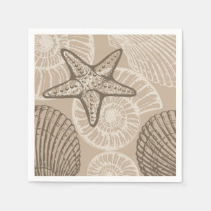 Coastal sealife starfish and shells in beige napkin