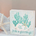 Coastal SEAS & GREETINGS Glitter Coral Starfish Wooden Box Sign<br><div class="desc">Decorate for the Christmas holiday season with this coastal or beach-themed wood box sign featuring gold and turquoise glitter starfish and coral, sand dollars, and a gold glitter SEAS & GREETINGS typography design. ASSISTANCE: For help with design modification or personalization, colour change, resizing, transferring the design to another product or...</div>