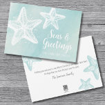 Coastal Watercolor Beach Christmas Holiday Card<br><div class="desc">Elegant Beach Seasons Greetings 'Seas & Greetings' Blue Watercolor Starfish Holiday Card. A fun play on 'Seasons Greetings' with 'Seas & Greetings' (you can change to the classic words if you want). Cute and simple modern beach themed print. A teal blue watercolor background with white starfish straight from the ocean!...</div>